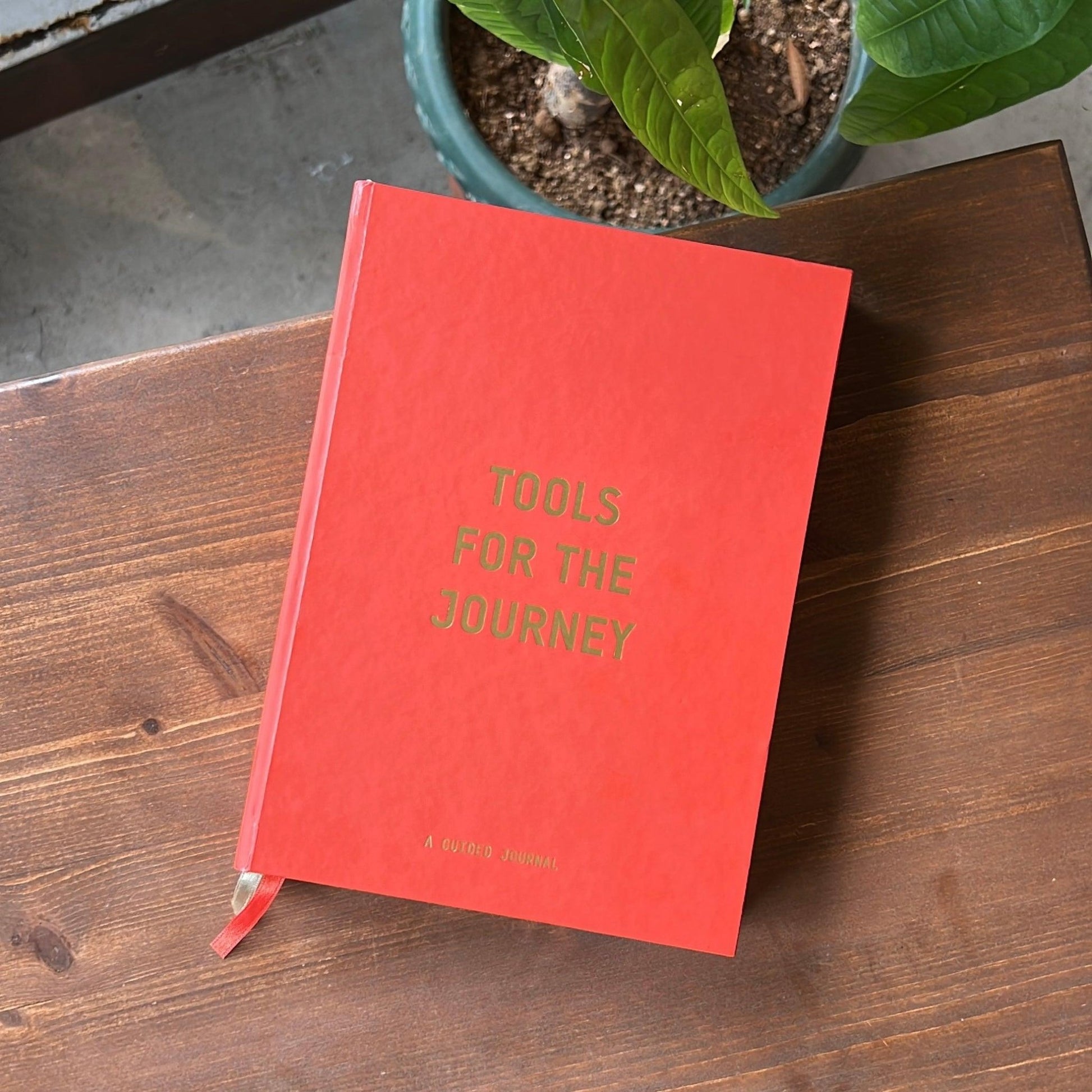 #guidedjournal #toolsforthejourney #goalsettingjournal #rachaeladams #journeystrength product photo - front cover - flat lay on table - aesthetic photo of journal  - tools for the journey guided journal - guided journal prompts - journal prompts - self-discovery journal